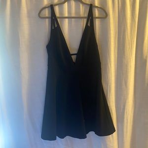 Black Express Fit and Flare Dress. Deep V neck